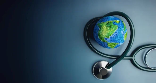 Stethoscope with a small globe of the world