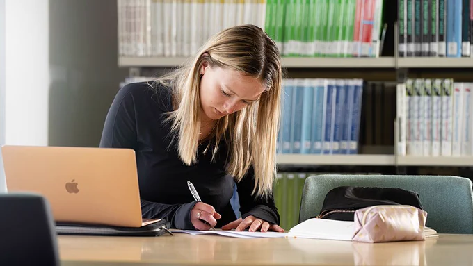 Student working in Business Library