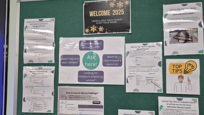 Display board highlighting research and library resources at Keyll Darree Library, the Isle of Man's only health and social care library