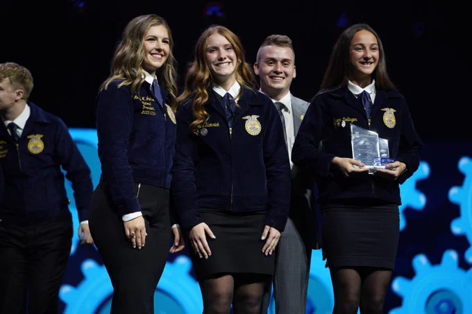 Signal Knob FFA students stand on stage at the National Convention to receive their award