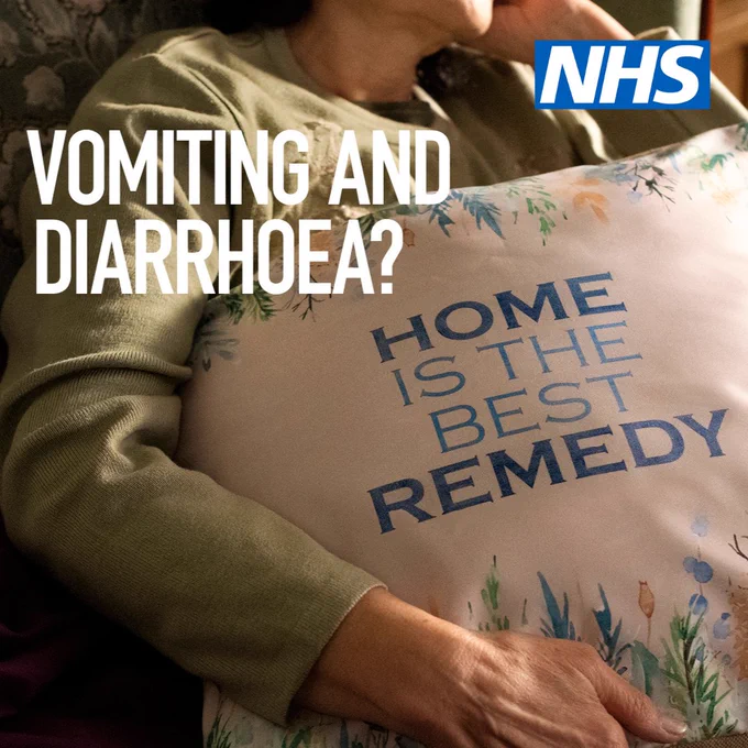Person sat on a sofa holding a cushion. Get reads; Vomiting and diarrhoea? 

Cushion also has text on it: Home is the best remedy. 