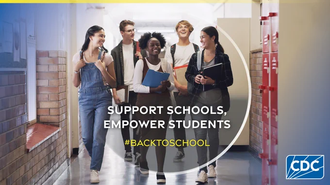 Image of students walking to classes with backpack and notebooks.