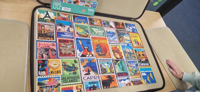 colourful jigsaw of stamps of the world.