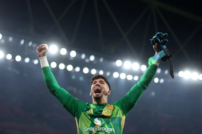 Altay Bayindir celebrates our progression into the FA Cup fourth round at the Emirates Stadium.