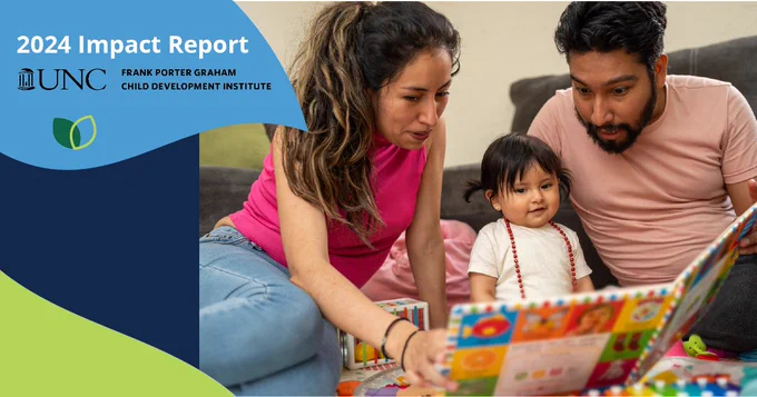 A latine mother and father read a picture book with their daughter.