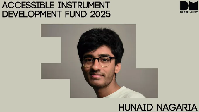 Hunaid facing the camera, wearing a white shirt and glasses.
