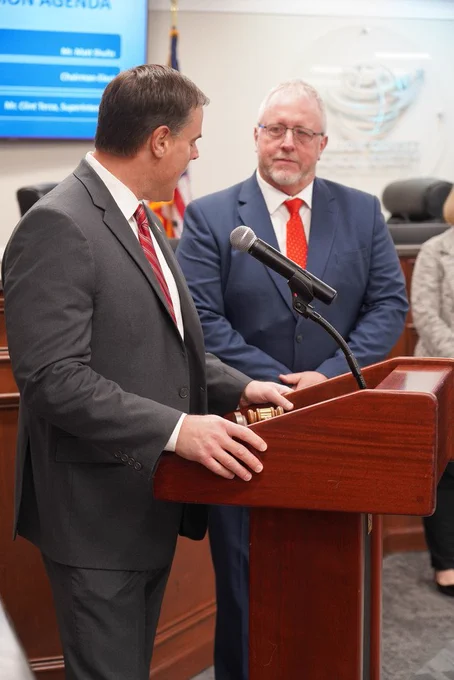 Tony Ross receiving an award from Superintendent Terza