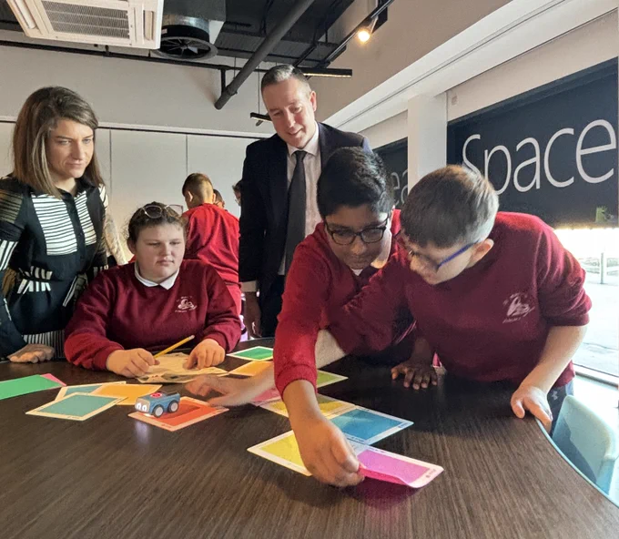 A picture of Dream Space Lead, Amanda Joliffe, Education Minister, Paul Givan and pupils of St Mary's PS. 