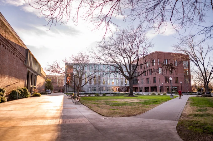 Clouds block the beaming sunlight near Meriam Library and the Science building on Chico State campus.

