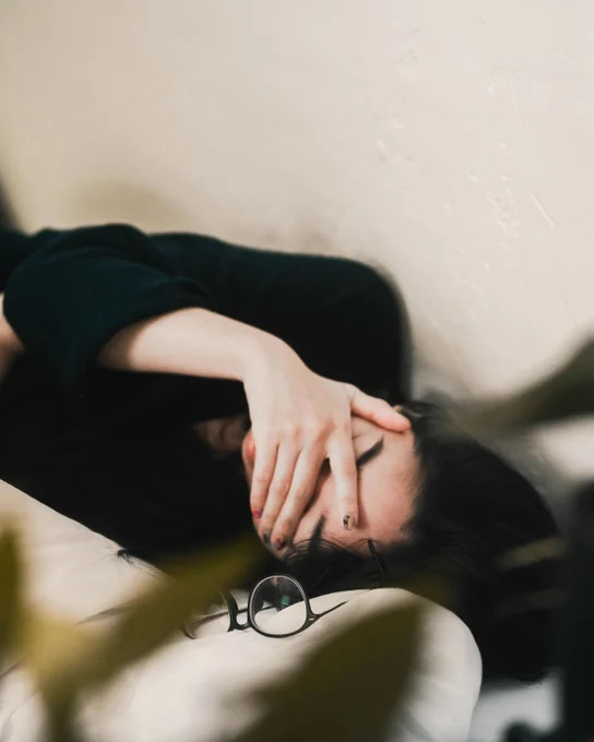 Photo by Ephraim Mayrena on Unsplash:

https://unsplash.com/photos/woman-in-black-long-sleeve-shirt-covering-her-face-zS8jbDBBZk0