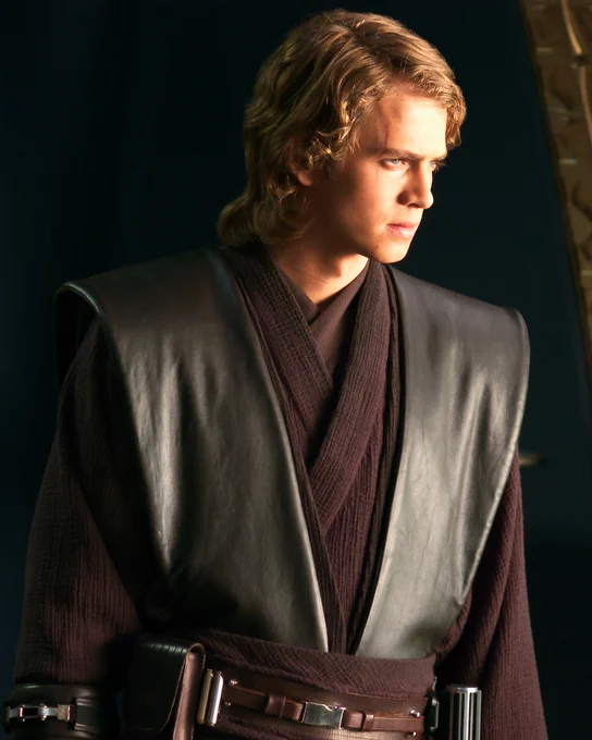 A shot of the Chosen One, Anakin Skywalker. The image is from Revenge of the Sith, Anakin is wearing his dark brown tunic and is looking intensely off to the right.