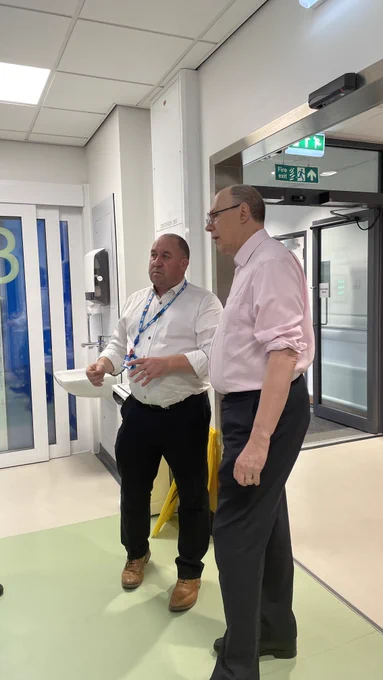 Huddersfield Royal Infirmary A&E department - people standing and talking