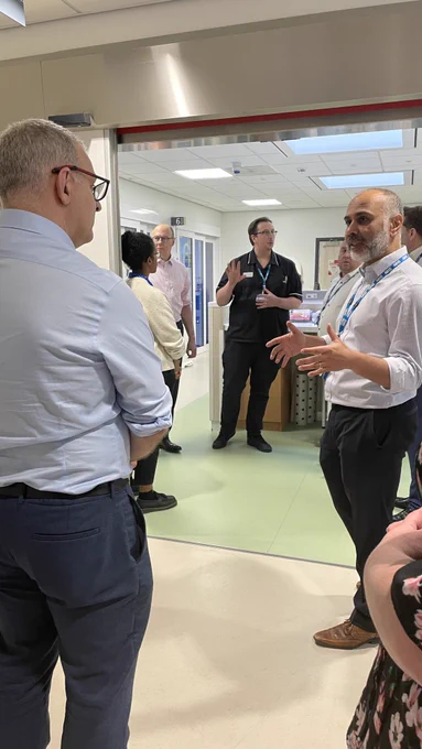 Huddersfield Royal Infirmary A&E department - people standing and talking