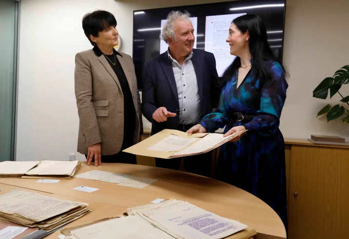 UCD President Professor Orla Feely, Richard Mulcahy, grandson of General Richard Mulcahy, with Dr Sandra Collins, University Librarian Credit: Mark Stedman

