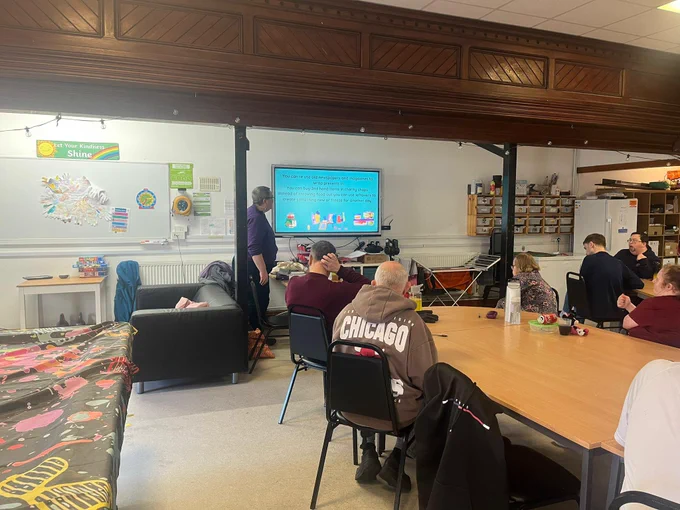 A group looking at a presentation