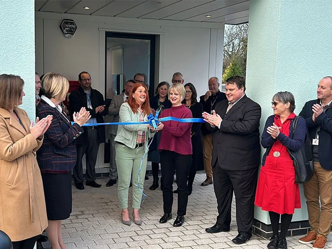 The family of Mark Duddridge cutting the ribbon to formally open the St Austell Elective Surgical Hub.