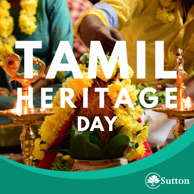 The words Tamil Heritage Day appear above an image of a traditional Pongal Celebration, featuring two people lighting intricately decorated oil lamps around a central flower arrangement. 