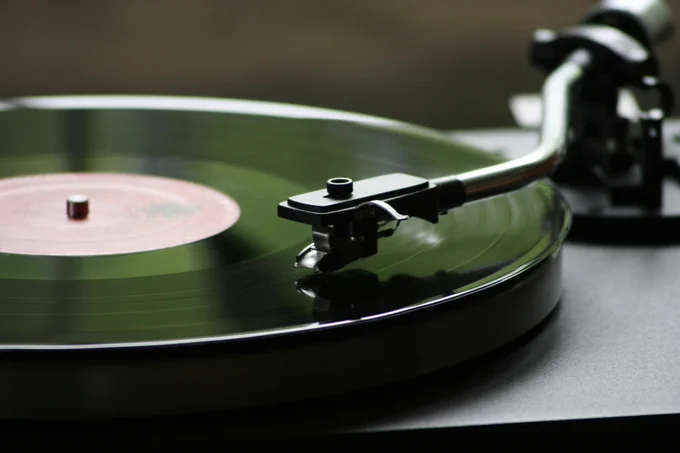 Vinyl record being played on a turntable