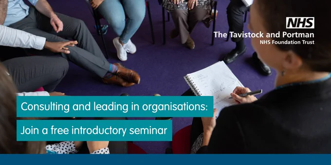 The background shows a group of people sitting in a circle (no faces) and a professional on the right leading the group, holding a notebook. There are two lines of copy. The first line says 'Consulting and leading in organisations' and the second line says 'Join a free introductory seminar'.  