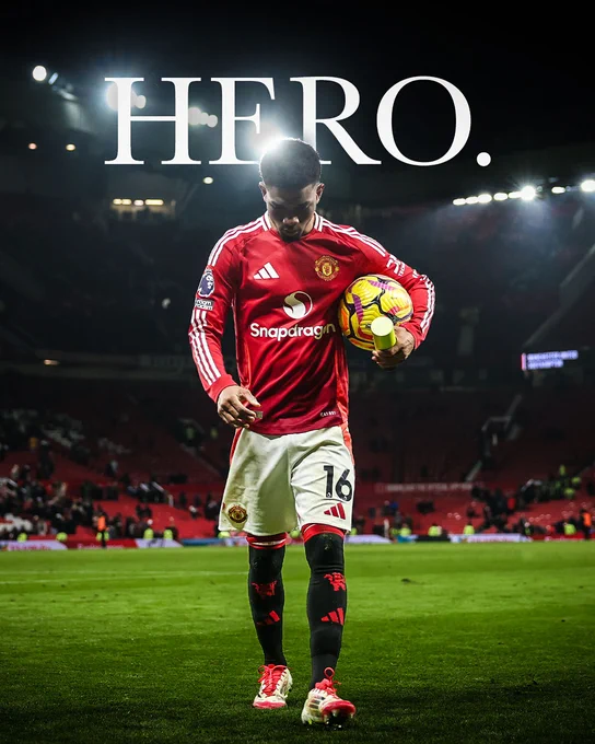 Amad with the Premier League match ball and the word 'HERO' behind his head.