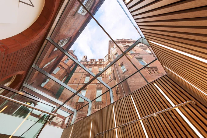 The Cruciform building seen through a glass ceiling. 