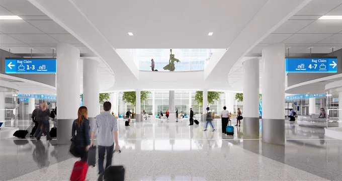 A sneak peak of what the new baggage claims area at CLT Airport will look like after construction finishes. The renderings show a wide, white, clean area.