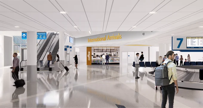 A sneak peak of what the new baggage claims area at CLT Airport will look like after construction finishes. The renderings show a wide, white, clean area.