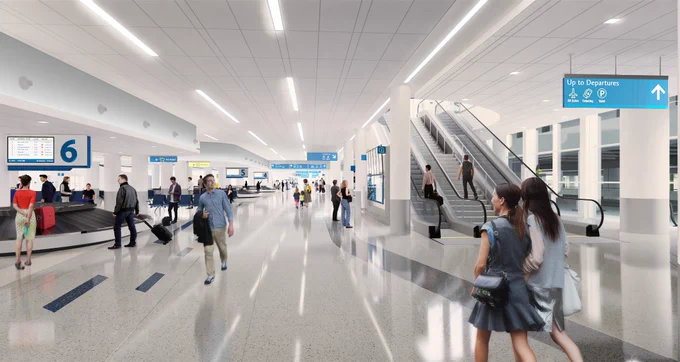 A sneak peak of what the new baggage claims area at CLT Airport will look like after construction finishes. The renderings show a wide, white, clean area.