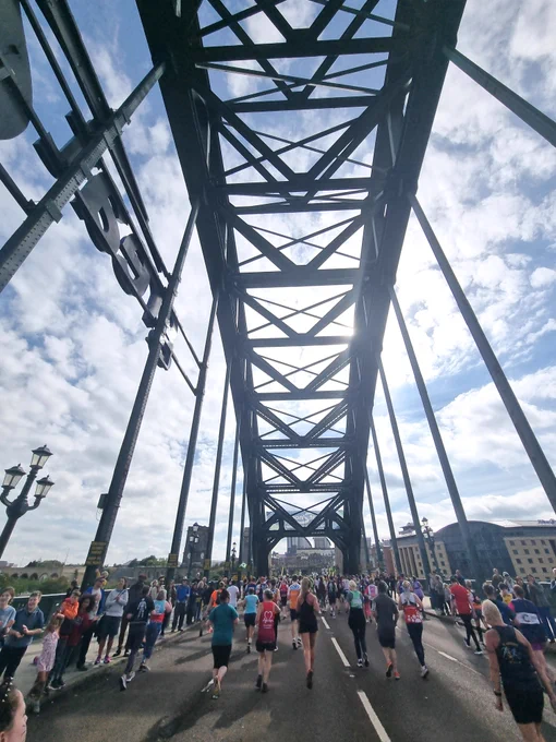 Runners cross the Tyne bridge in Newcastle. 