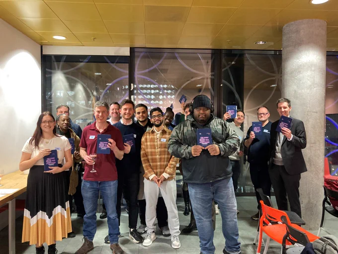 Our attendees showing off their Business IP Centre note pads.