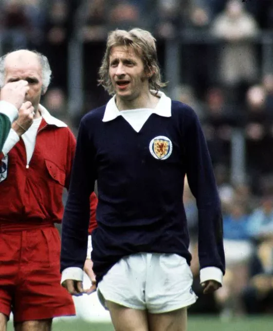 Denis Law playing for Scotland.