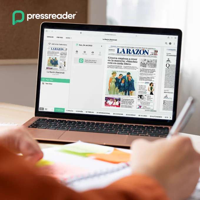 Image of someone using Pressreader on their laptop device to read a newspaper.