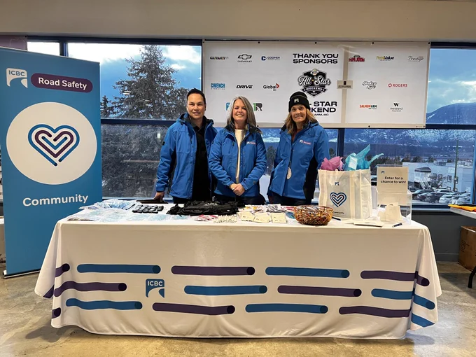 ICBC road safety coordinators at an ICBC booth