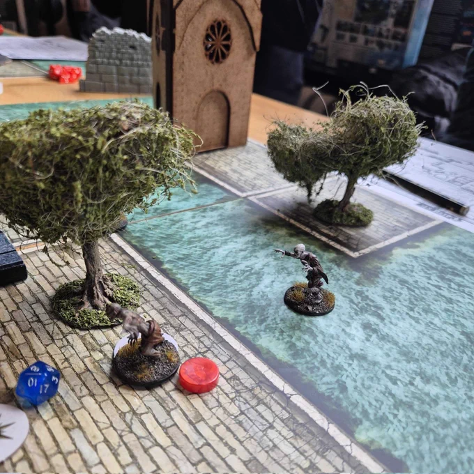 Zombie miniatures on a table at the board game shop in Edinburgh Ancient Robot Games.