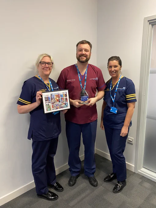 Daniel Storey with his employee of the month award.