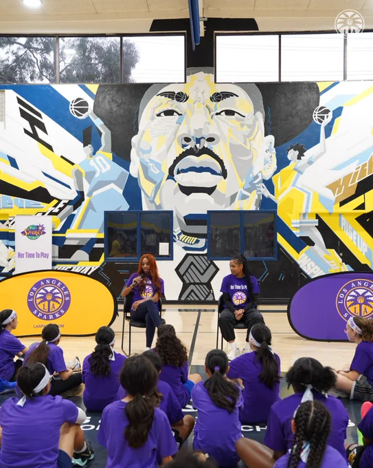 Lexie and Zia speaking to a group of girls at a We Are Girls Event in Long Beach. 
