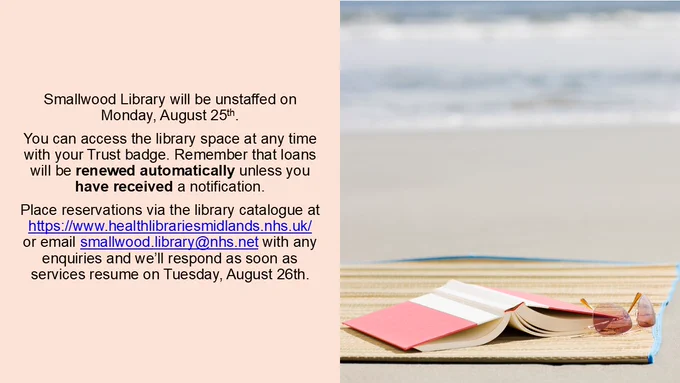 Book and sunglasses on a table by the beach