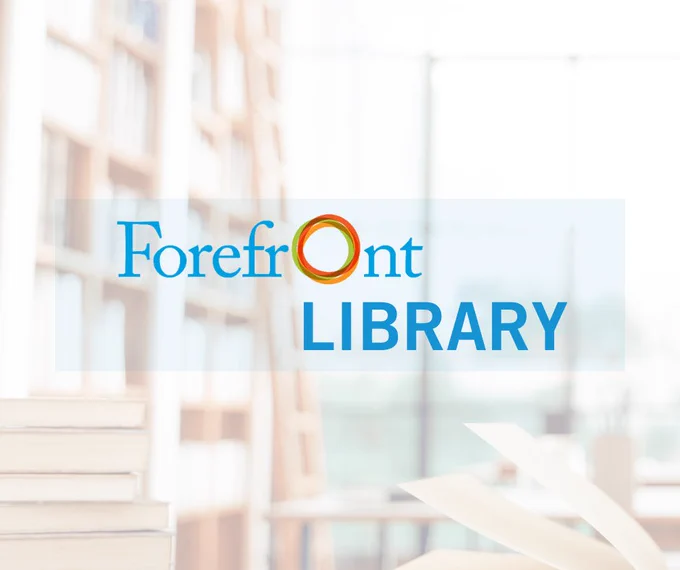 Logo of Forefront Library over a blurred background of bookshelves and a building.