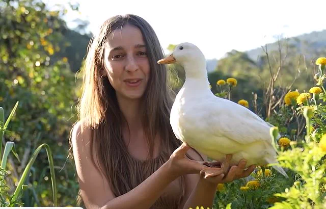 The Better Help ad woman holds a duck