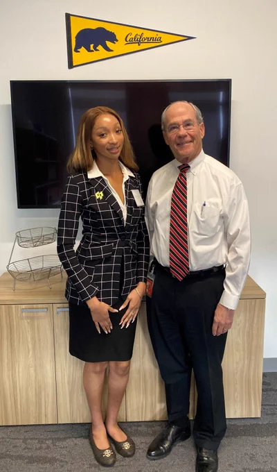 Photo of Sierra Hollinsworth and Roger Niello in an office.