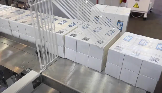 Marden Edwards banding machine  - here you can see banded cosmetics cartons collated in bundles of 3 x 2, ready for transit and display.