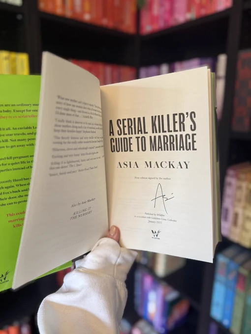 Photo showing the book A Serial Killer's Guide To Marriage by Asia Mackay signed by the author. 
