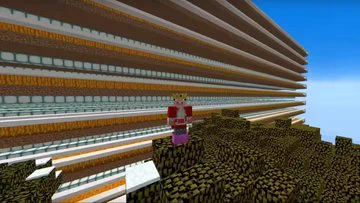 Another screenshot of the video "Skyblock: Potato war 3 (FINALE)" of Technoblade standing on a tree in front of his gigantic pumpkin farm, which are giant rectangular platforms of pumpkins and beacons floating in layers in the sky. Techno's wearing enchanted leather boots.