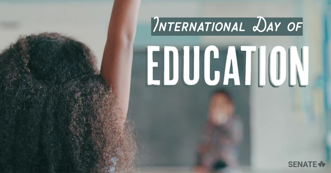 Schoolgirl lifting her hand in class. International Day of Education.