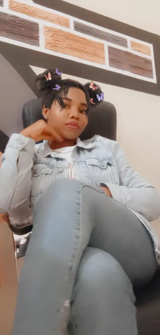 Photo of Mata Pollyn sitting down 