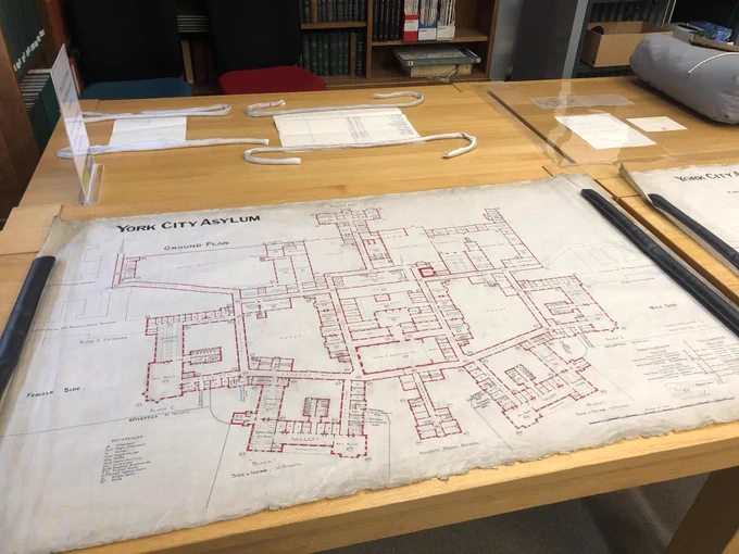 A large plan showing the layout of York City Asylum laid out in the exhibition.