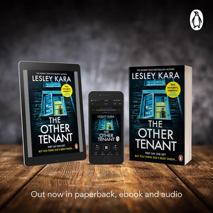 Copies of The Other Tenant in ebook, tablet and paperback format on a wooden surface against a grey background.