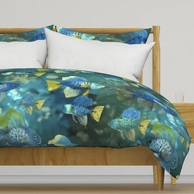A vibrant underwater scene features a school of fish with vivid blue and yellow hues swimming in various directions. The background suggests a serene aquatic environment with soft light filtering through the water.

© Susan Rydberg