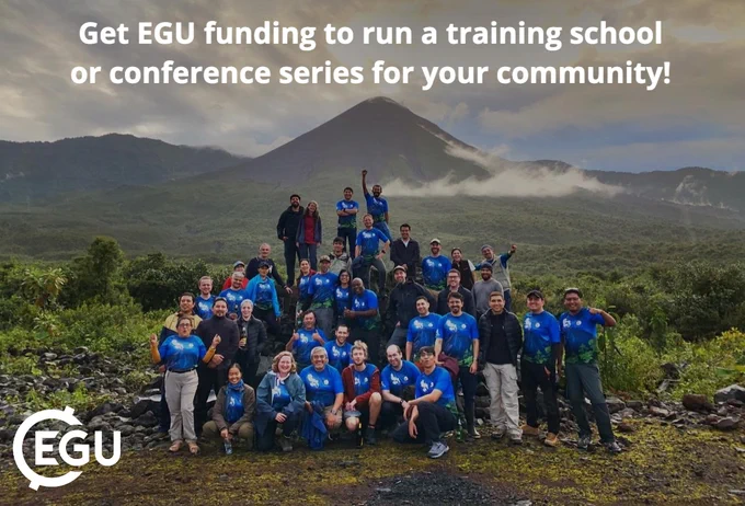 Photo of several people standing in front of a volcanic landscape wearing blue t-shirts and happy smiling faces. Text reads 'Get EGU funding to run a training school or conference series for your community!'