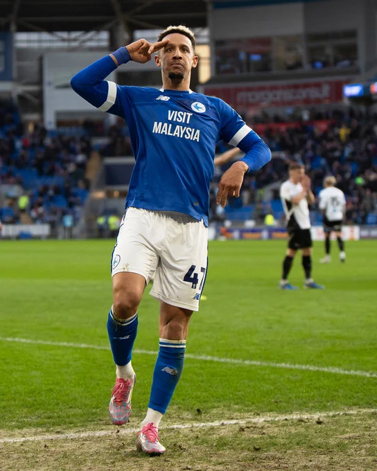 Callum Robinson celebrates his opening goal at Cardiff City Stadium against Derby County.